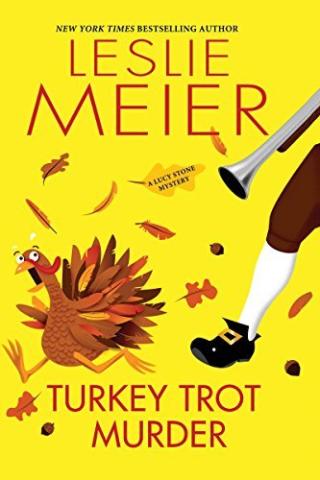 Yellow book cover with a cartoon turkey running from someone dressed as a pilgrim. Reads New York Times bestselling author Leslie Meier Turkey Trot Murder